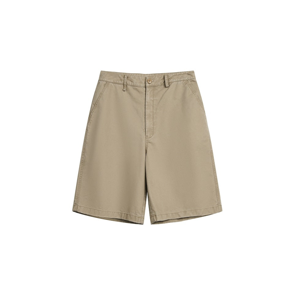 Khaki knee-length shorts with flat front, button fly, belt loops and side pockets, flat lay on white