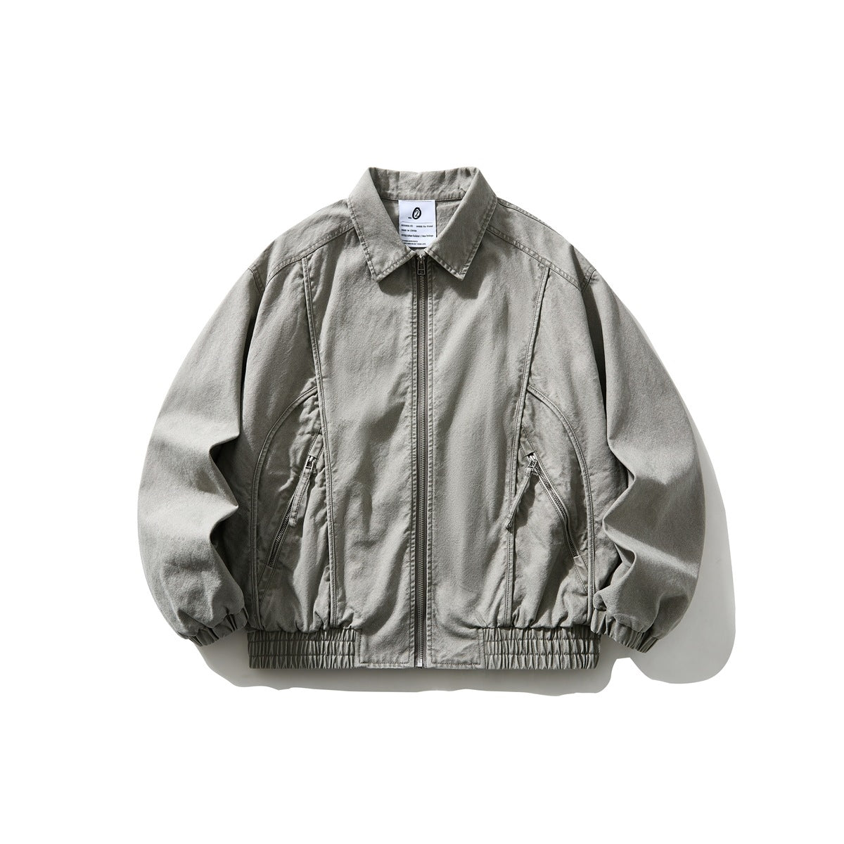 Gray washed zip-up collared jacket, front flat lay, with diagonal zip pockets and elastic cuffs and hem