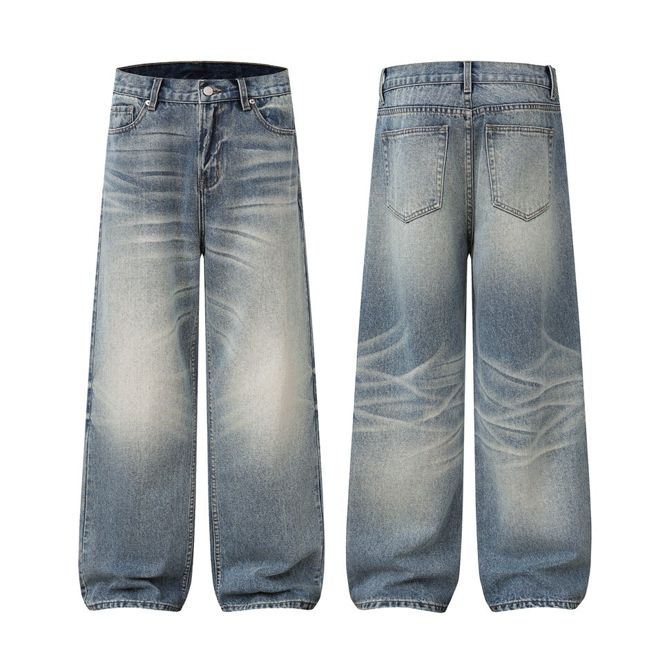 Front and back views of wide-leg blue washed jeans with fading, belt loops, and back patch pockets.