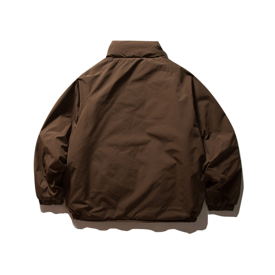 Brown puffy jacket back view with stand collar, raglan sleeve seams and elastic cuffs and hem