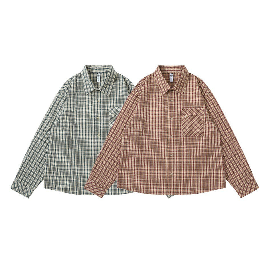 Two long-sleeve plaid button-up shirts laid flat: one beige and navy, the other red and beige.