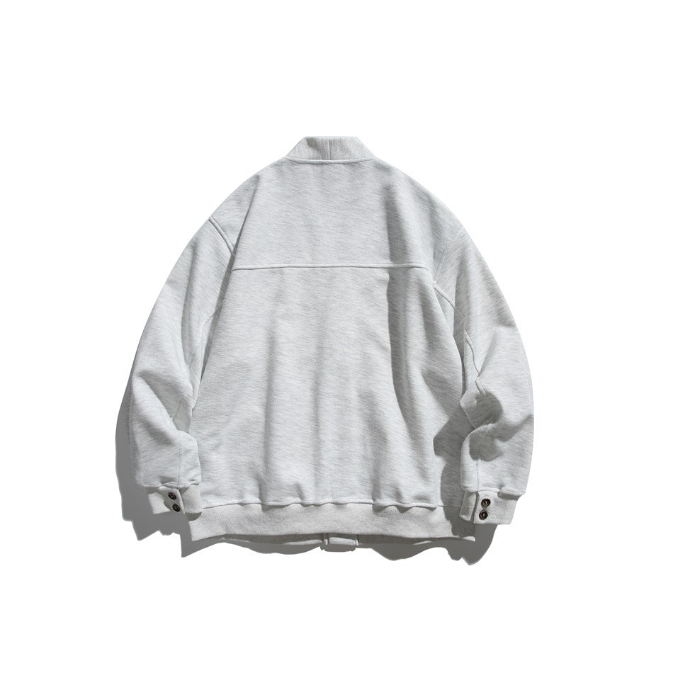 Back view of a light gray cardigan with a high collar, long sleeves, ribbed cuffs, and a ribbed hem.