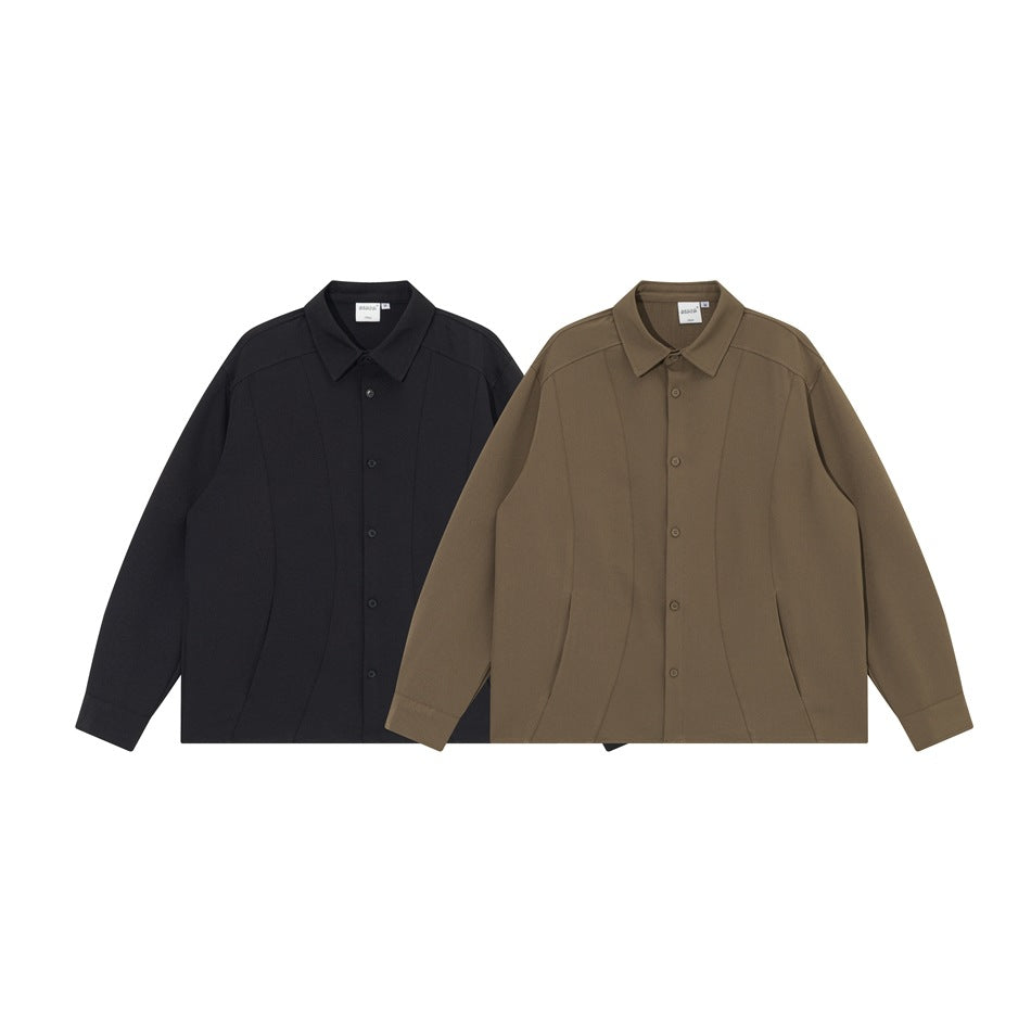 Two long-sleeved button-up shirts shown from the front: one black and one brown, both with pointed collars.