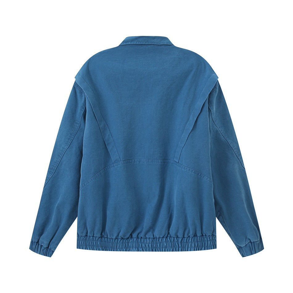 Back view of a blue jacket with curved seam panels, long sleeves, and an elasticated hem and cuffs.