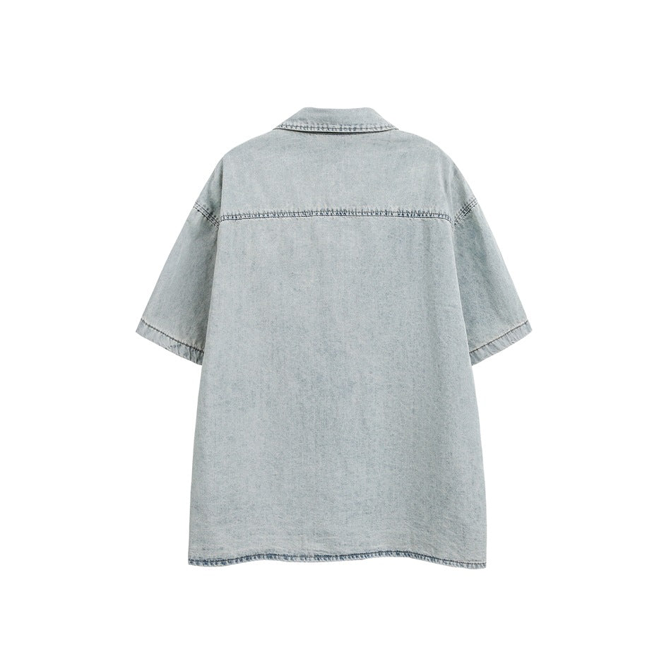 Back view of a pale washed-blue short-sleeve button-up shirt, shown against a white background.