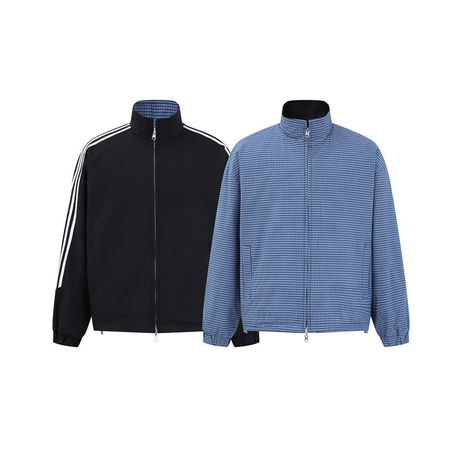 Reversible jacket shown on both sides: black with white sleeve stripes and blue micro-check