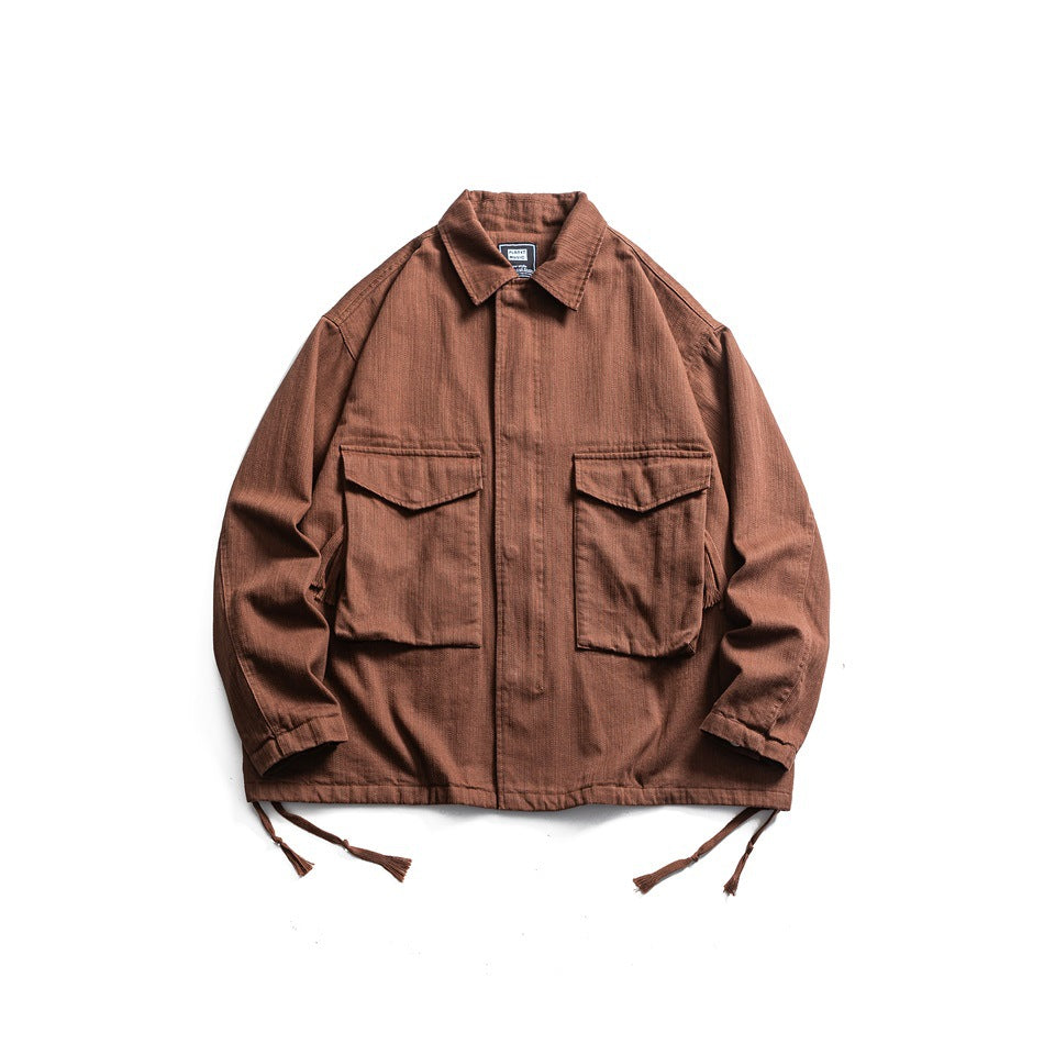 Brown collared jacket flat lay with two large flap chest pockets and tasseled hem drawcords