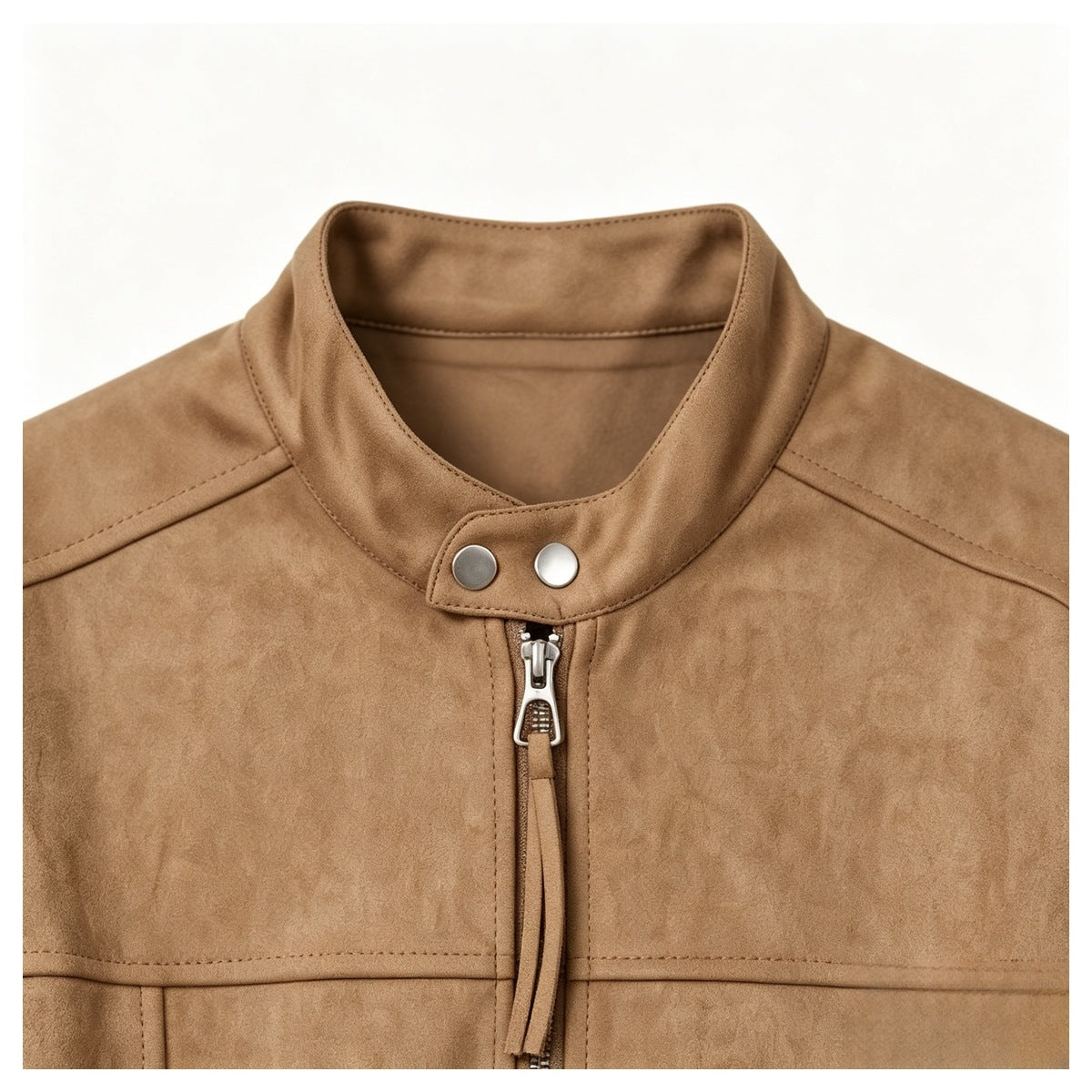 Close-up of a tan jacket’s stand collar with silver snaps and a central zipper.