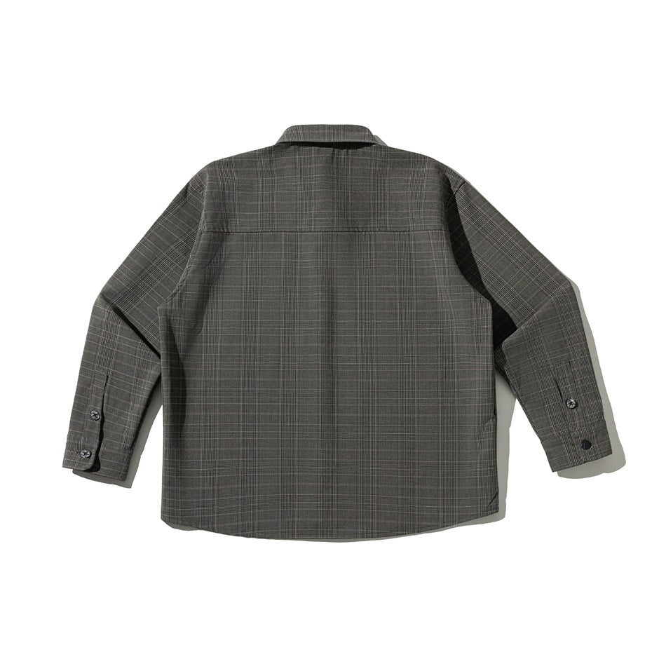 Back view of gray plaid long-sleeve shirt laid flat showing yoke seam and buttoned cuffs