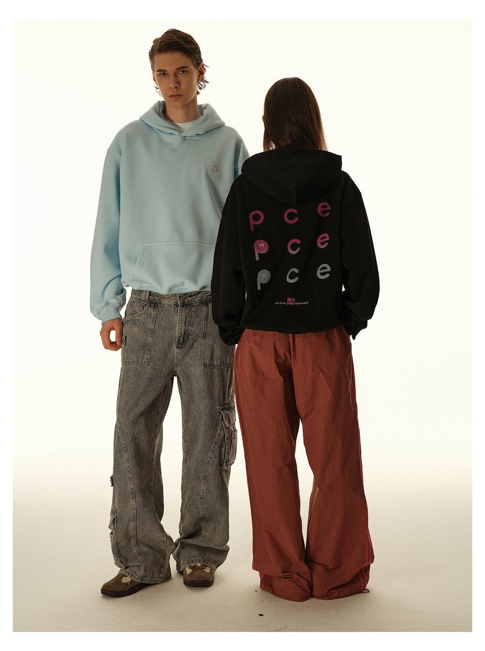 Two models show the front of a light blue hoodie and the printed back of a black hoodie.