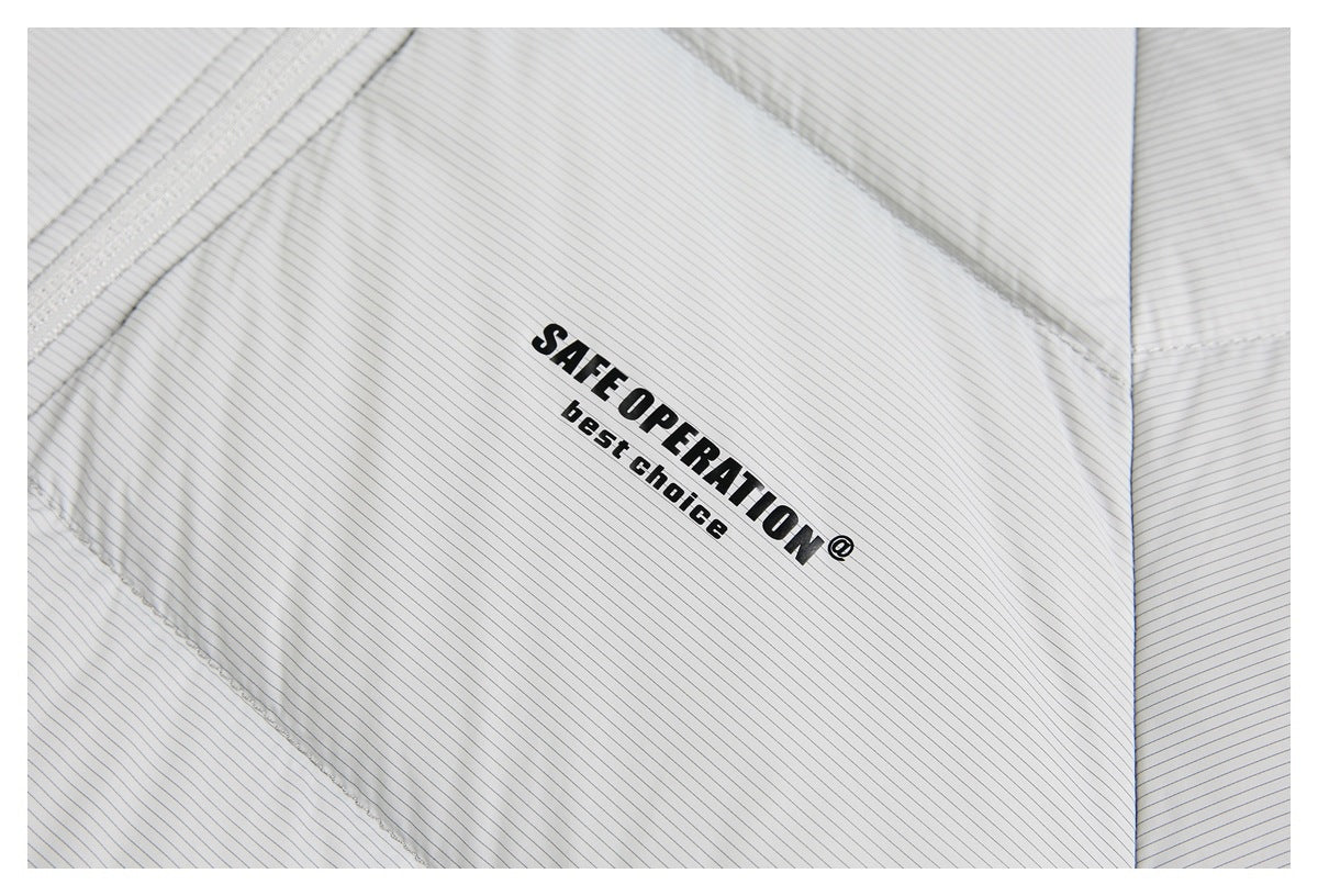 Close-up of light gray pinstriped fabric with black “SAFE OPERATION best choice” lettering printed on it.