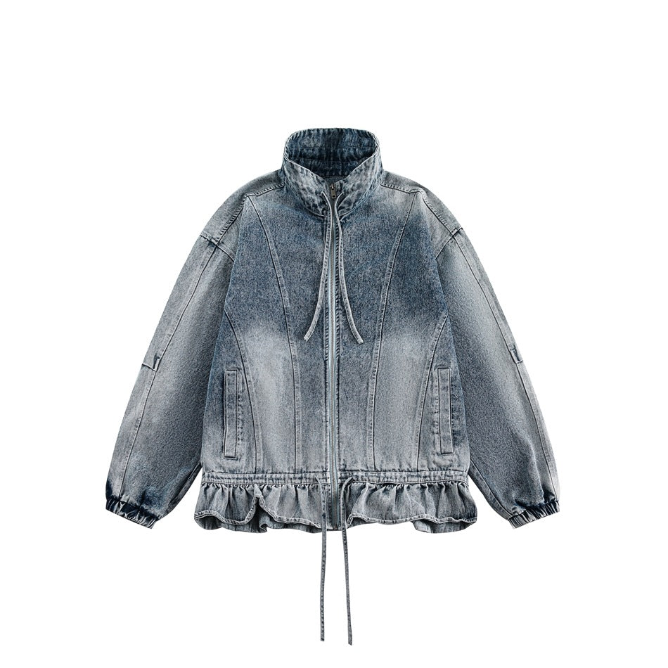 Blue washed denim jacket flat lay with stand collar, front zip, ruffled drawstring hem and elastic cuffs