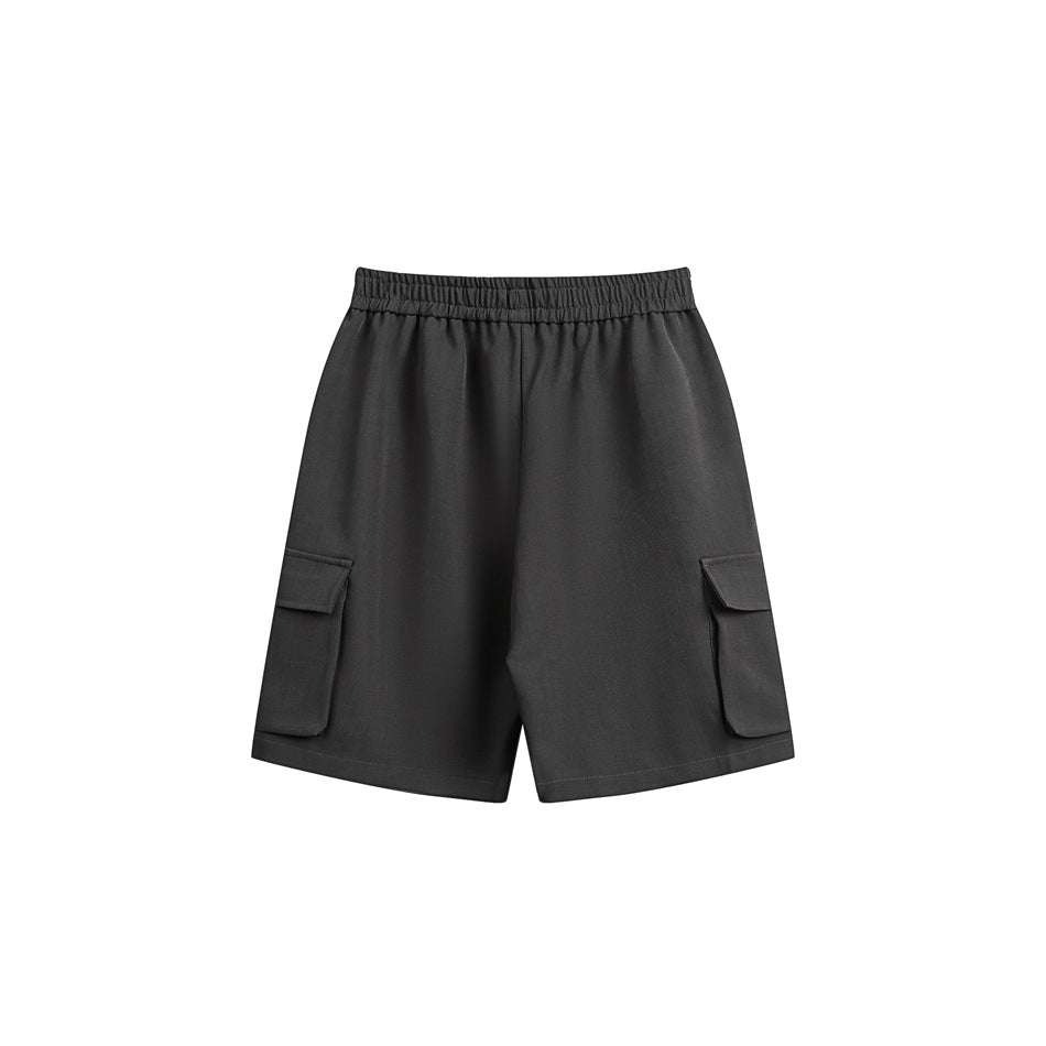 Charcoal gray shorts shown from the front, with an elastic waistband and flap cargo pockets on both legs.