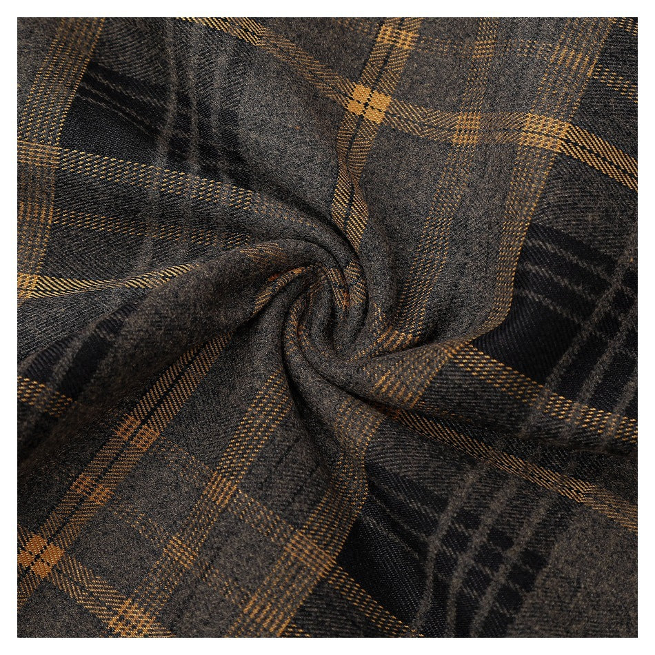 Close-up of gray-brown plaid fabric gathered into a twist, showing mustard and black checks.