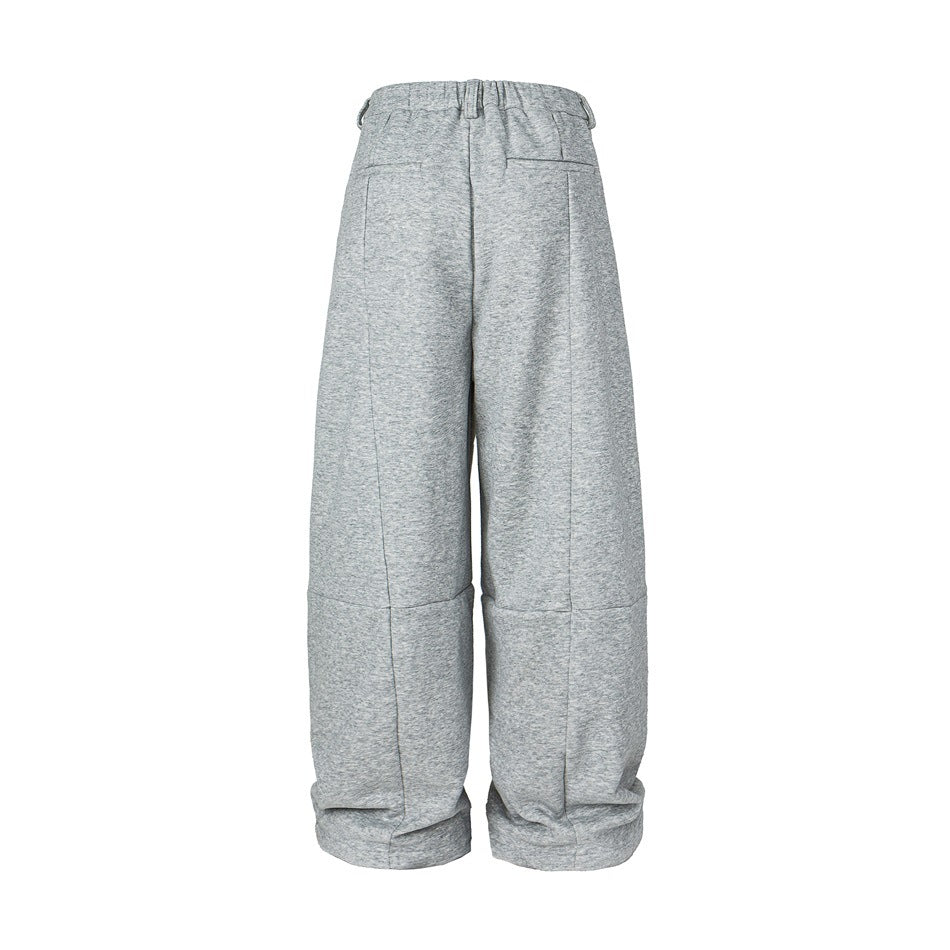 Back view of heather-gray wide-leg trousers with two rear pockets and folded cuffs.