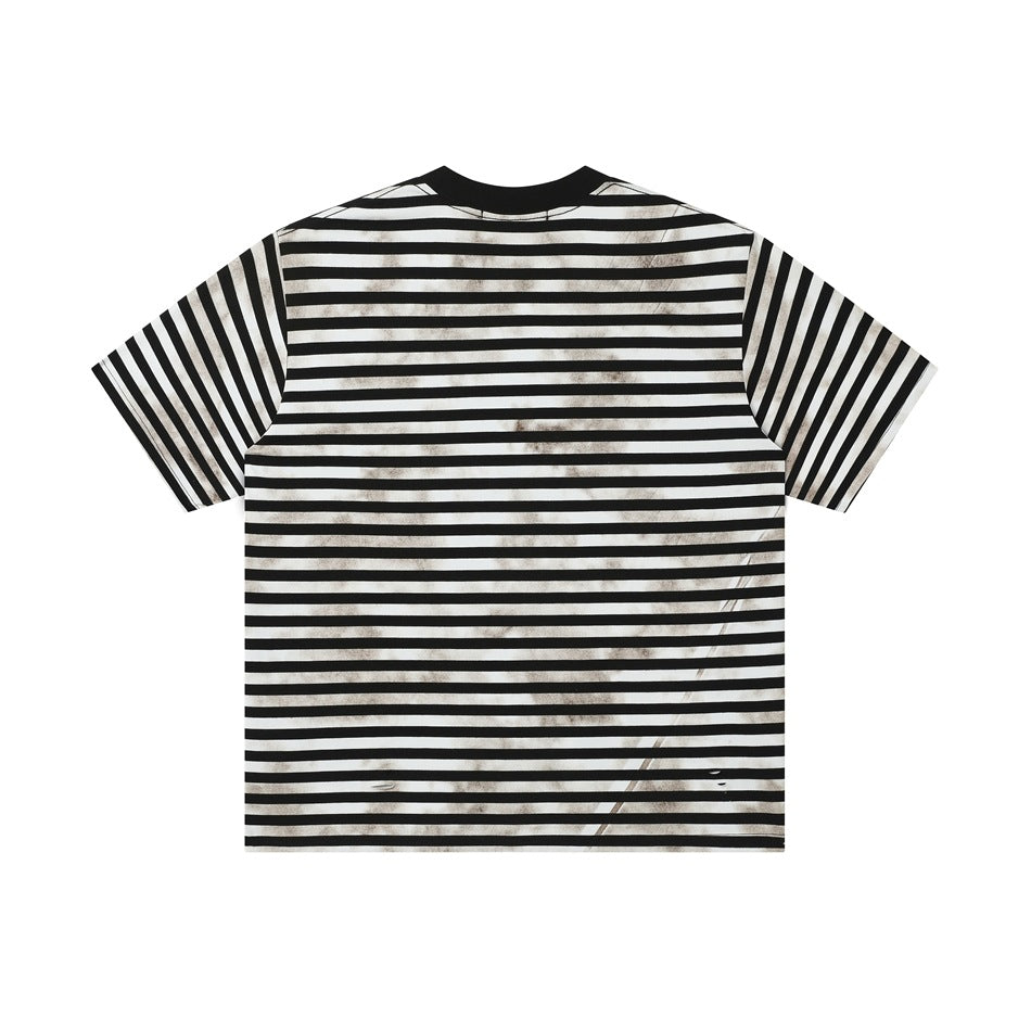 Back view of black and white striped short-sleeve T-shirt with smudged weathered effect and small distressed spots