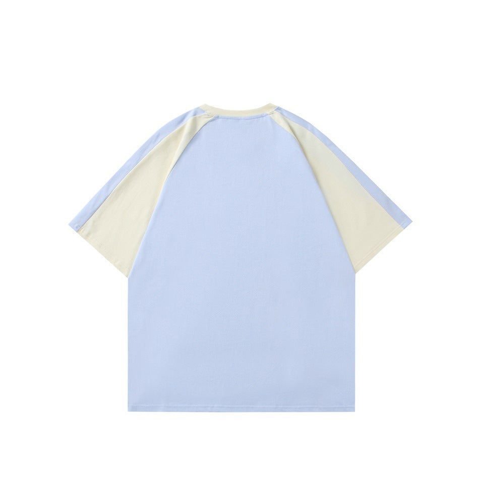 Back view of a light blue T-shirt with cream raglan sleeves and blue sleeve accents.