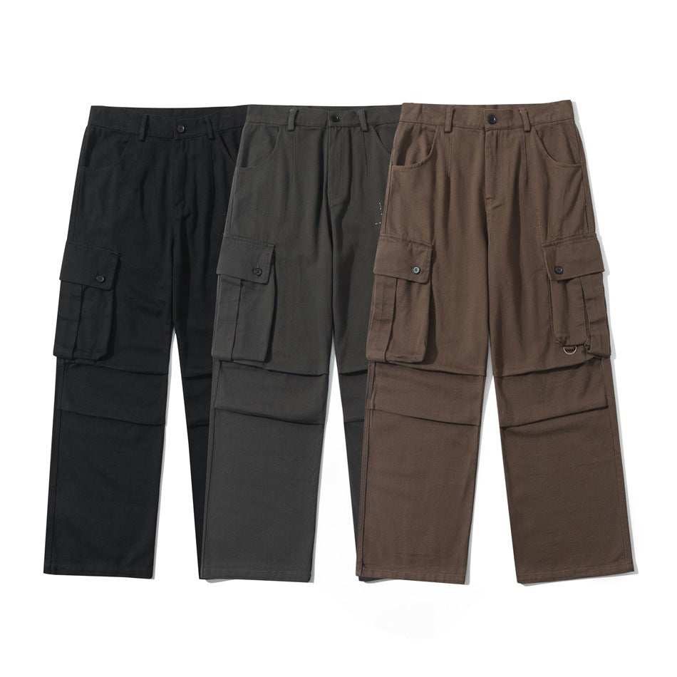 Three pairs of wide-leg cargo pants shown from the front in black, dark gray, and brown.