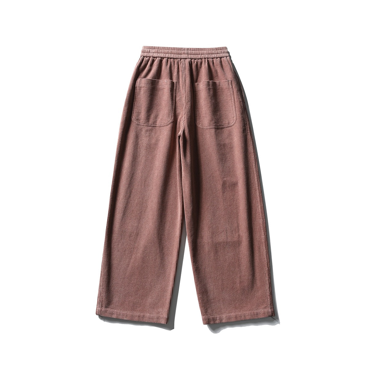 Back view of dusty rose wide-leg ribbed pants with an elastic waistband and two patch pockets.