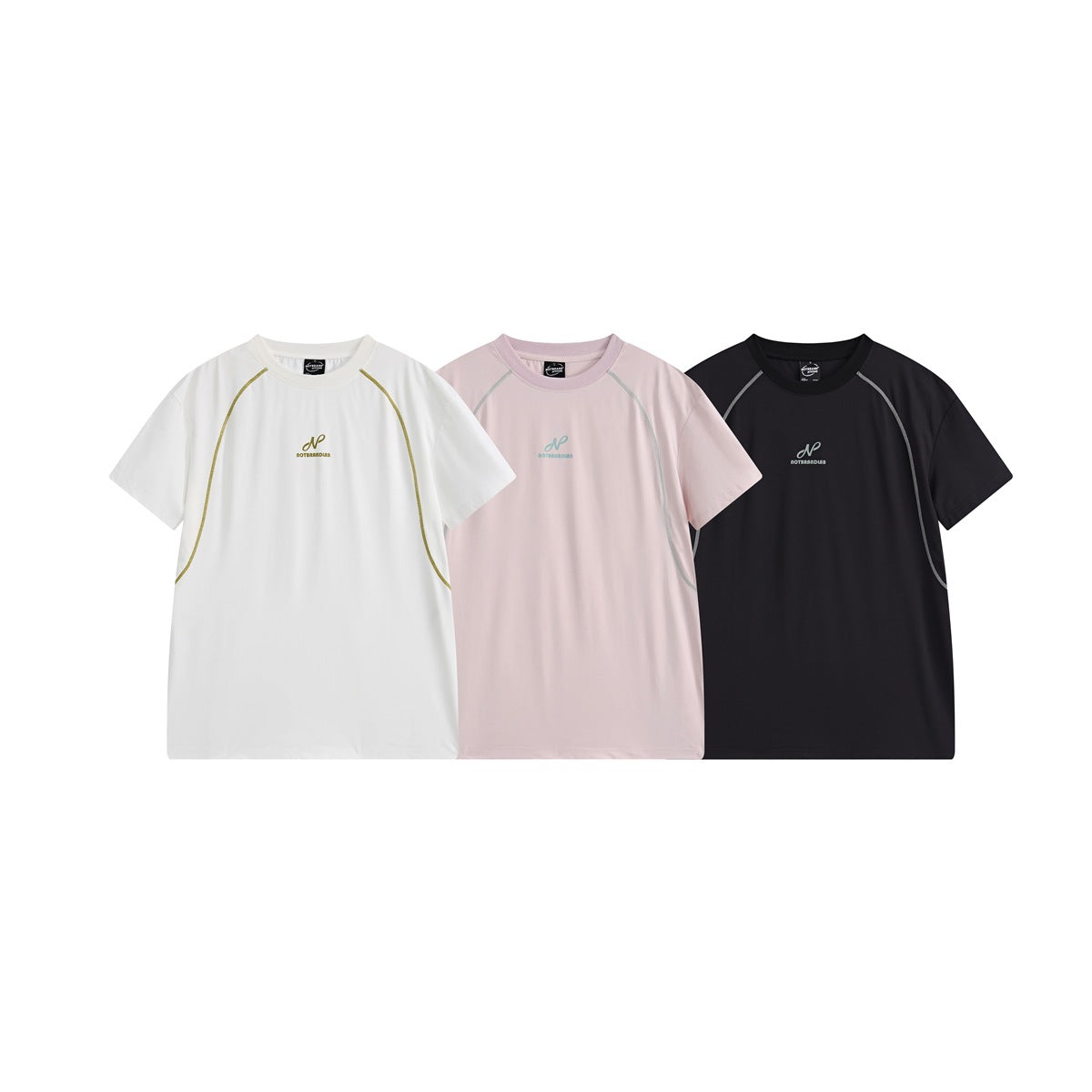 Front views of short-sleeve crew-neck T-shirts in white, pale blush, and black, each with contrast seam details and a small