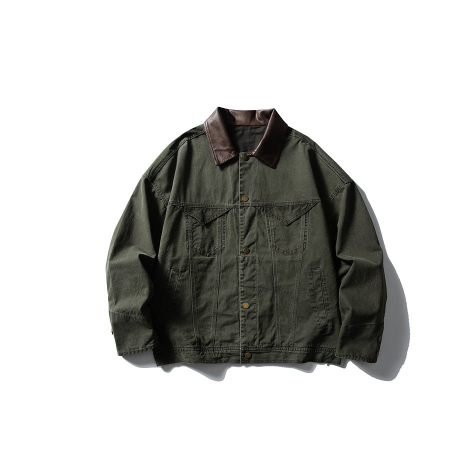 Green jacket with brown leather-look collar, snap front, chest flap pockets and side pockets, flat lay front view