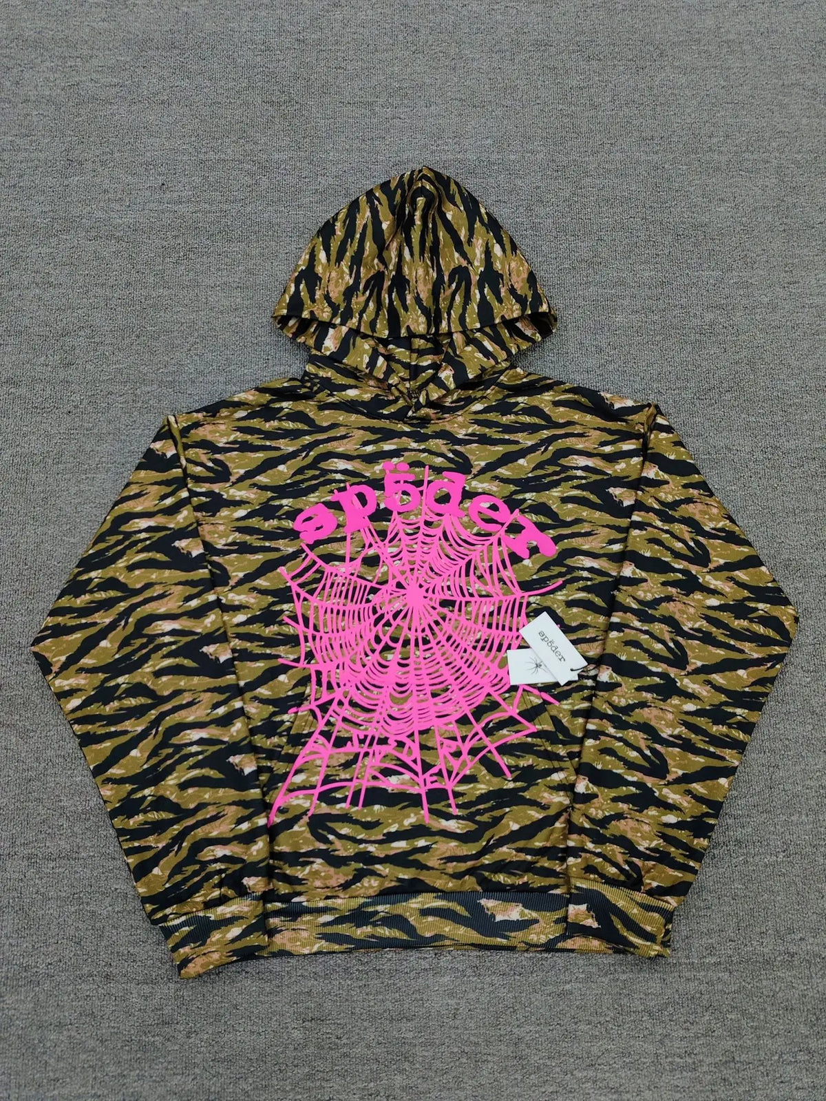 Sp5der pullover hoodie with tiger camo print and pink spider web graphic on the front