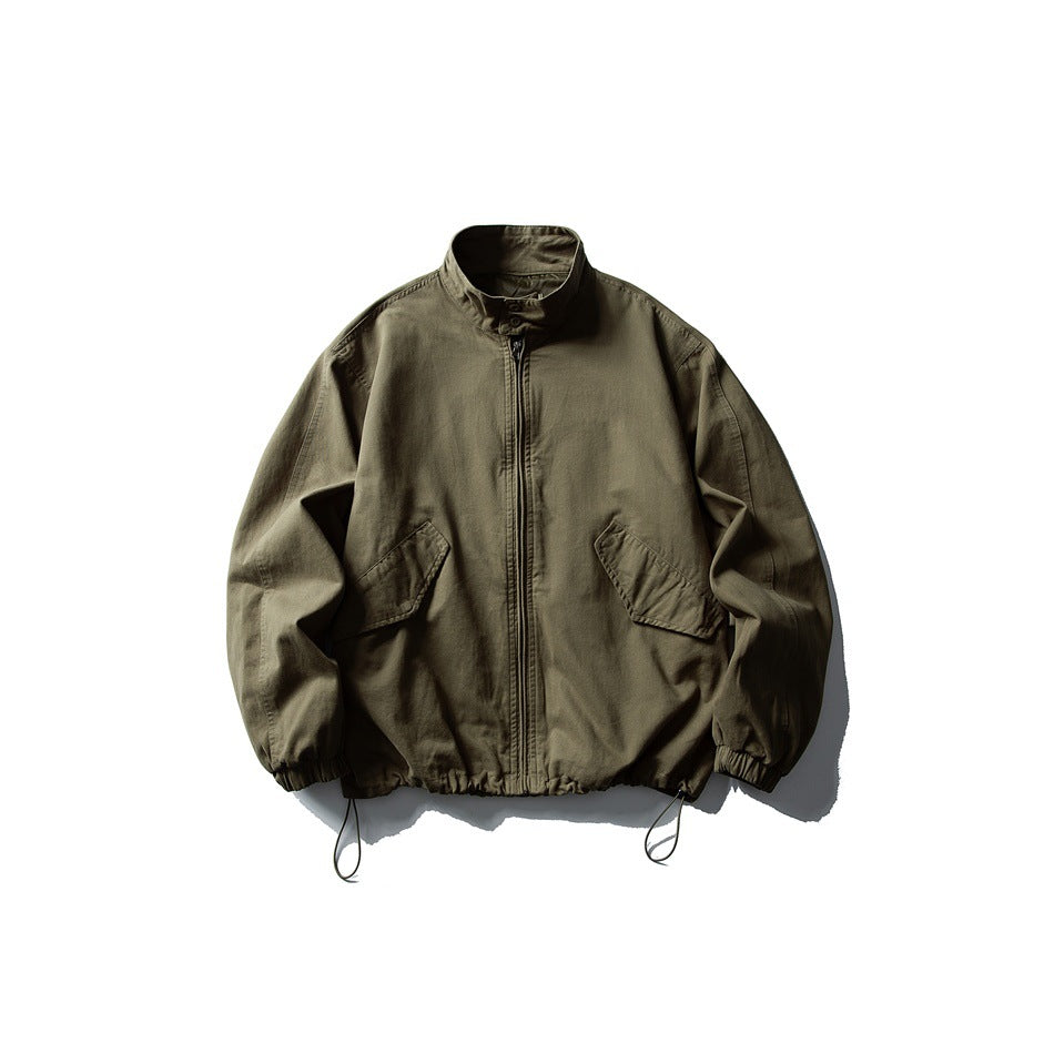 Olive green stand-collar zip jacket flat lay with flap pockets, elastic cuffs and drawcord hem