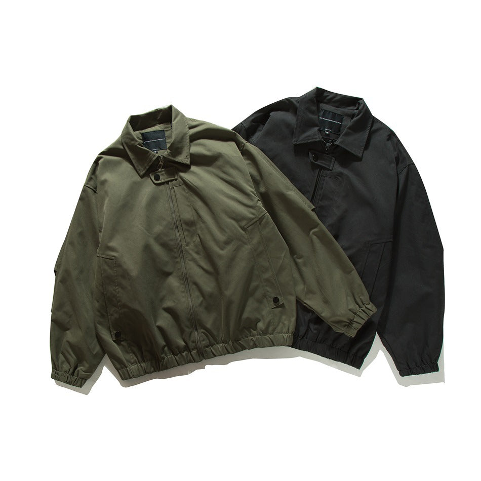 Two collared zip-front jackets shown flat, one olive green and one black, with elastic cuffs and hems.
