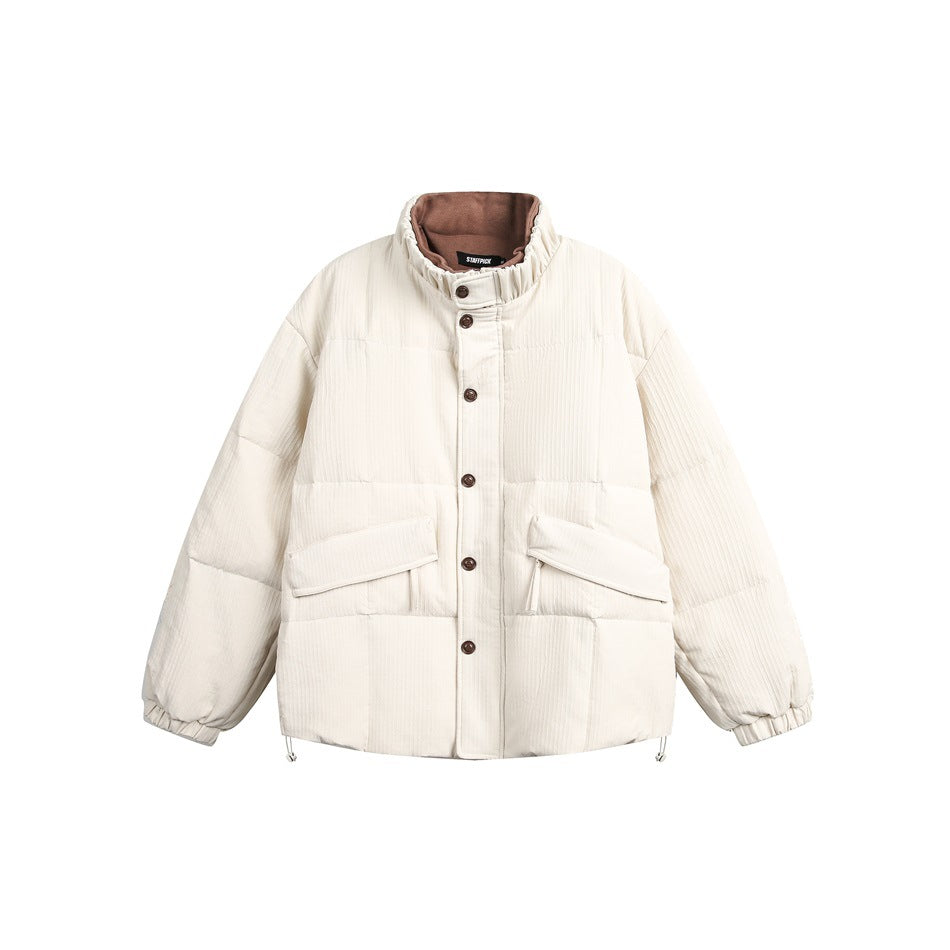 Front view of an ivory quilted puffer jacket with a high collar, button closure, and flap pockets.