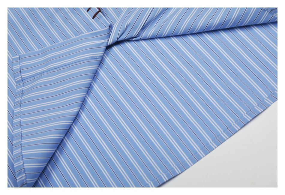 Close-up of the shirt's interior fabric and seams, showing the blue and white stripe pattern.