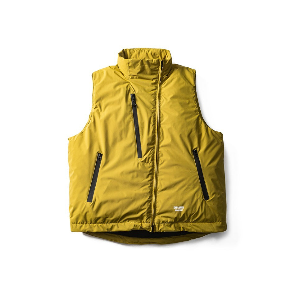 Mustard green sleeveless stand-collar vest laid flat with asymmetrical zip and slanted zippered pockets