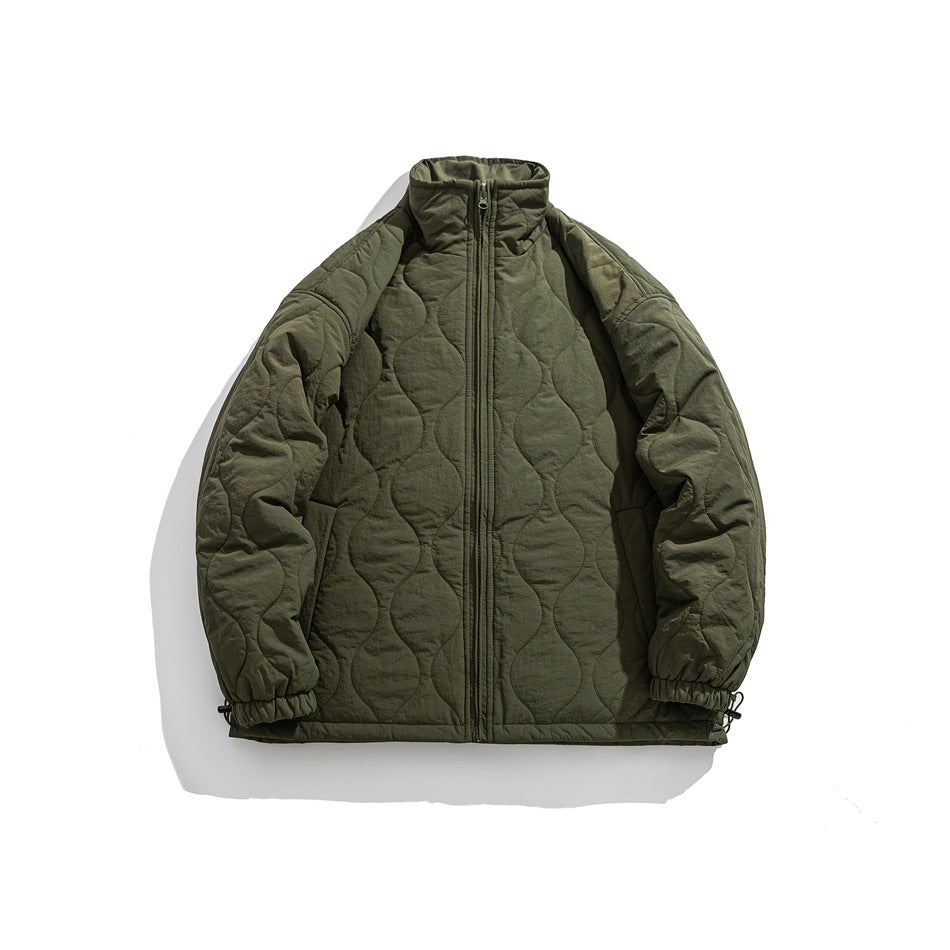 Dark olive quilted jacket shown from the front, with a high collar, full-length zipper and elastic cuffs.