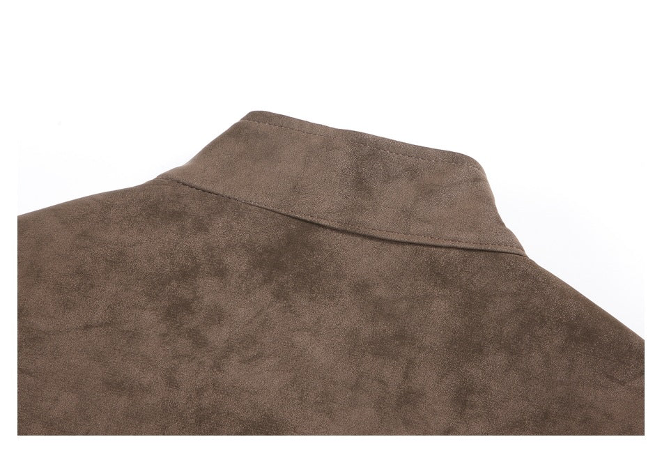 Close-up of the brown jacket's raised collar and back neckline stitching.
