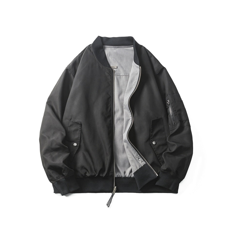 Black bomber jacket shown open from the front, revealing a light gray lining and its central zipper and pockets.