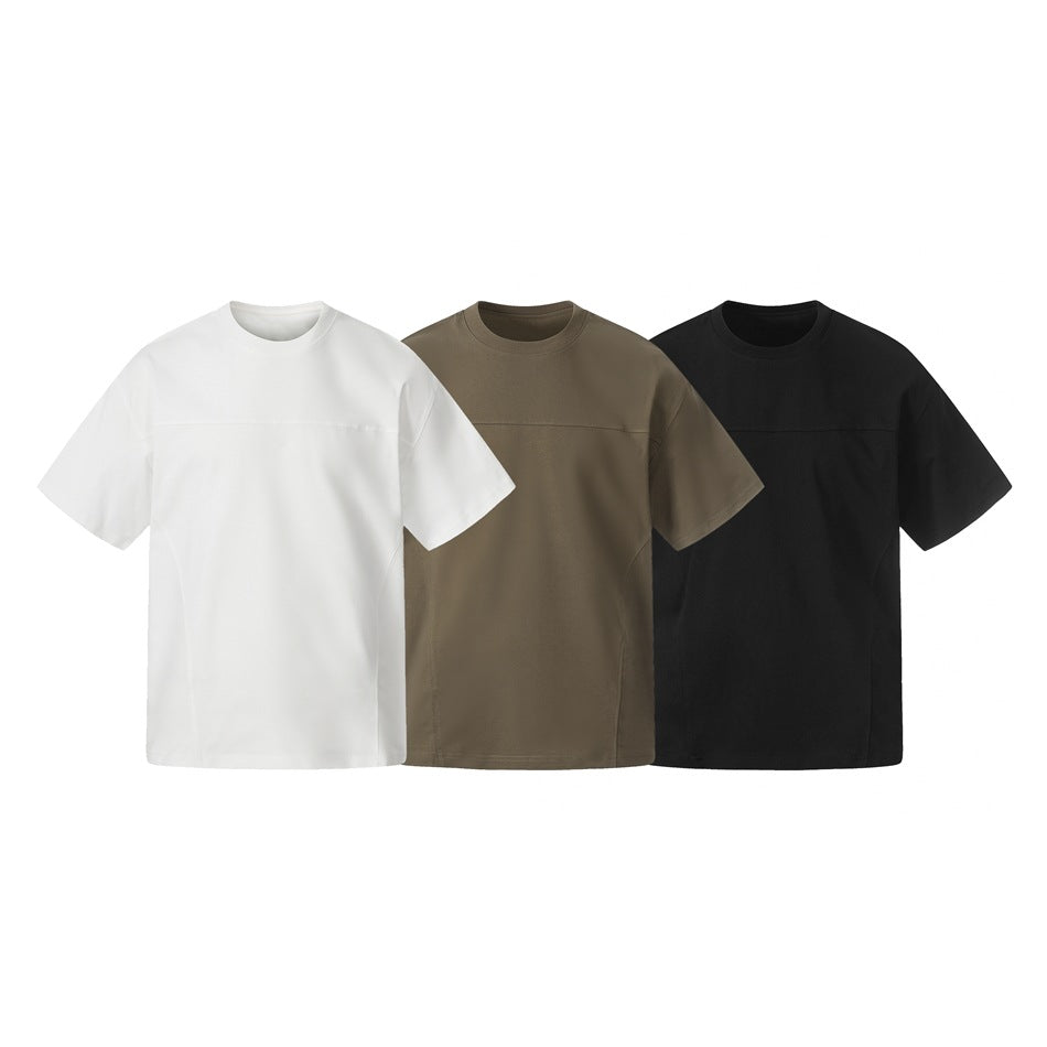 Three short-sleeve crewneck T-shirts shown side by side in white, olive-brown, and black.
