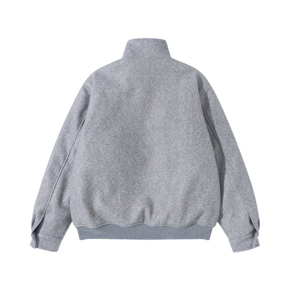 Back view of gray stand-collar jacket with ribbed hem and tab cuffs, flat lay