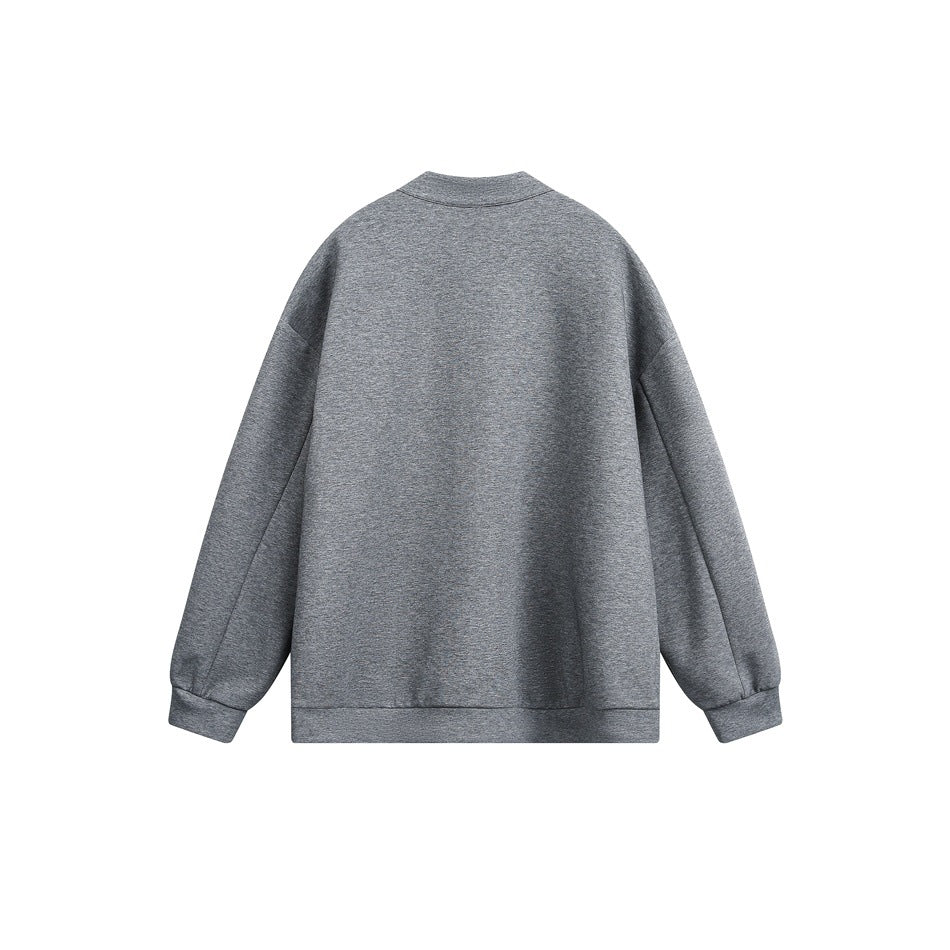 Heather gray long-sleeved pullover shown from the back, with a short band collar and ribbed cuffs and hem.