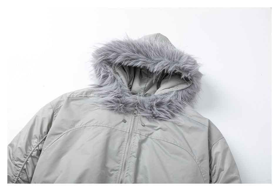 Close-up of the light gray jacket's fur-trimmed hood, front zipper, and upper chest.