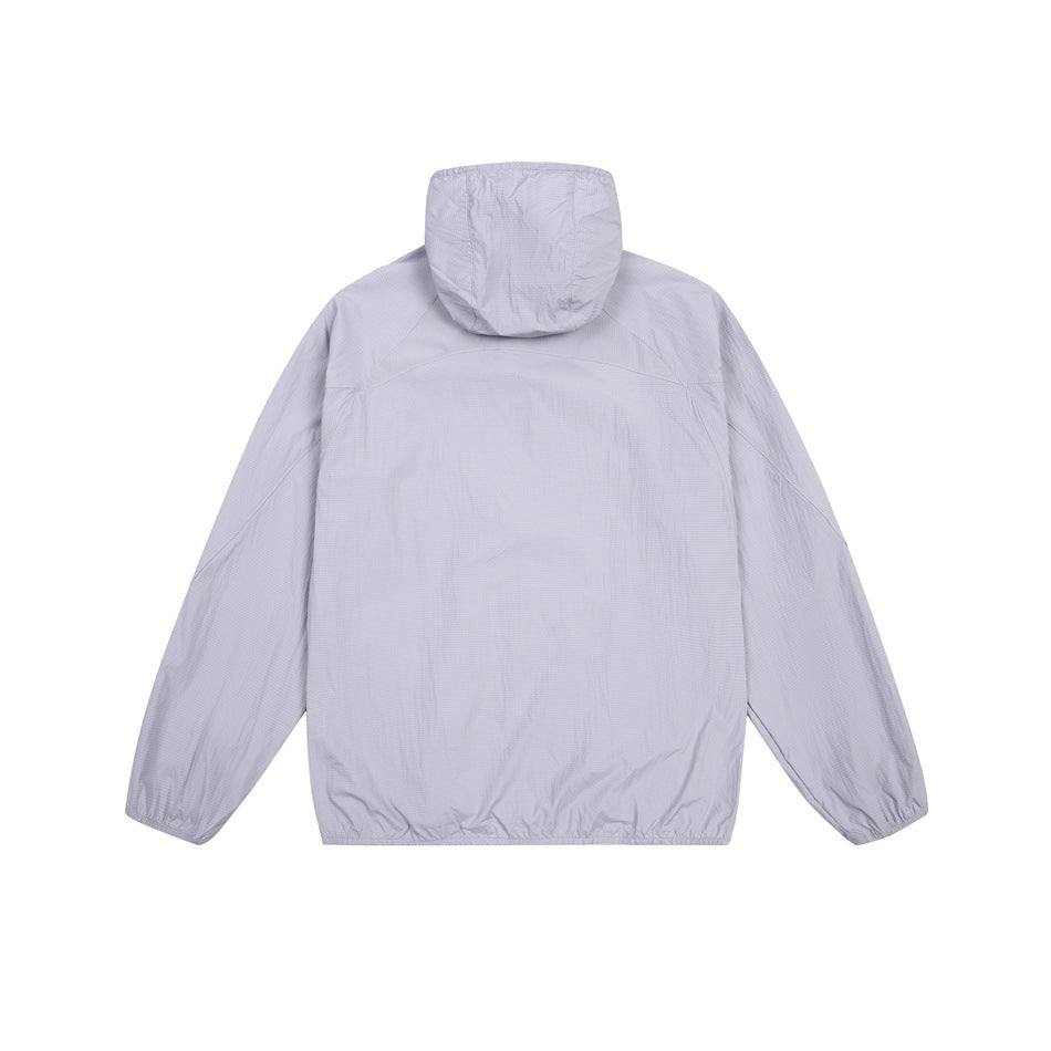 Back view of a pale gray-lavender hooded jacket with long sleeves and elasticized cuffs and hem.