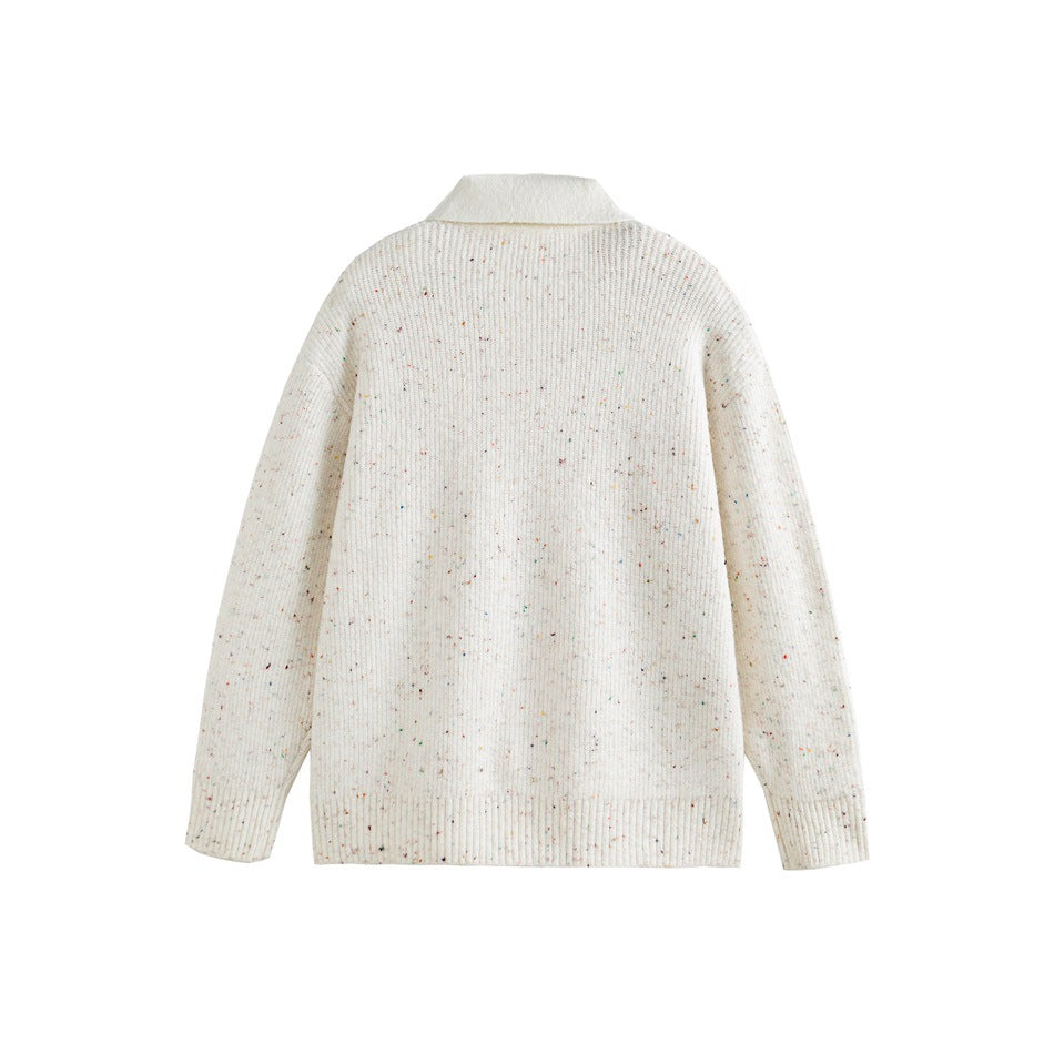Back view of an ivory knit sweater with multicolored flecks, a folded collar, and ribbed cuffs and hem.