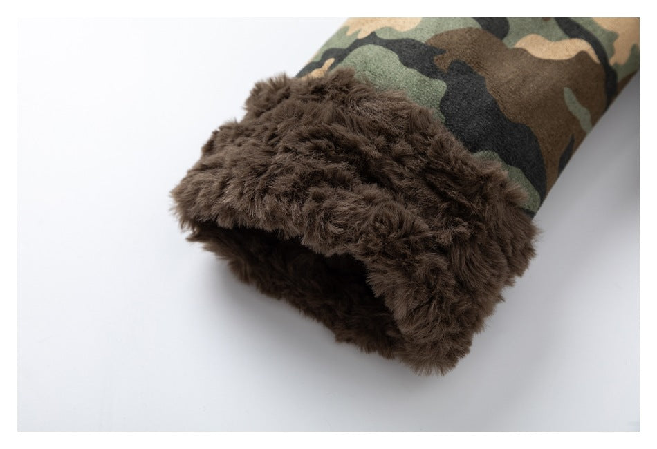 Close-up of a sleeve cuff with thick dark brown plush lining and camouflage outer fabric.