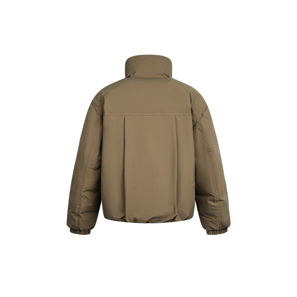 Back view of a taupe padded jacket with a tall stand collar, long sleeves, elastic cuffs, and a gathered hem.