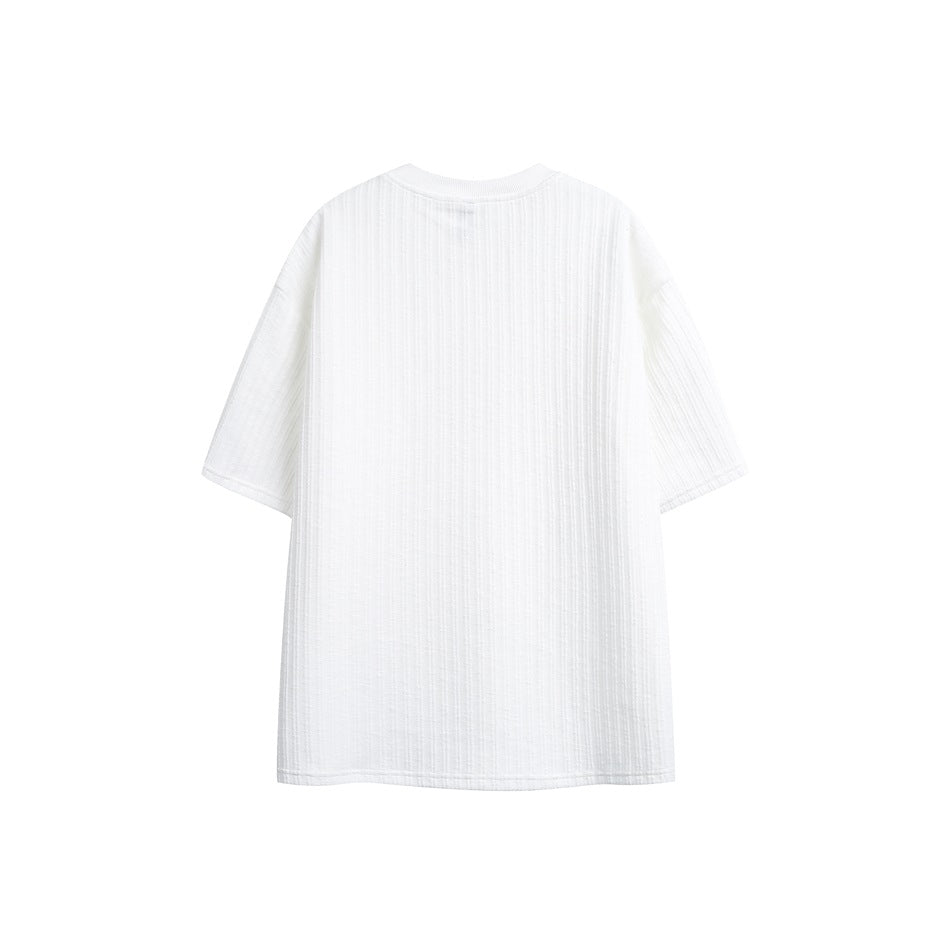 Back view of a white short-sleeve ribbed shirt laid flat on a white background.
