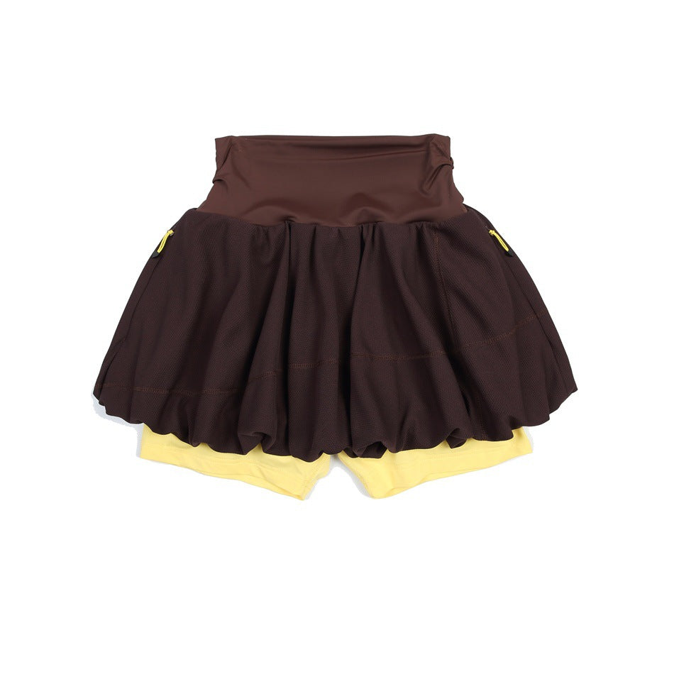 Brown high-waist skort with gathered bubble hem, side zip pockets and yellow inner shorts, flat view