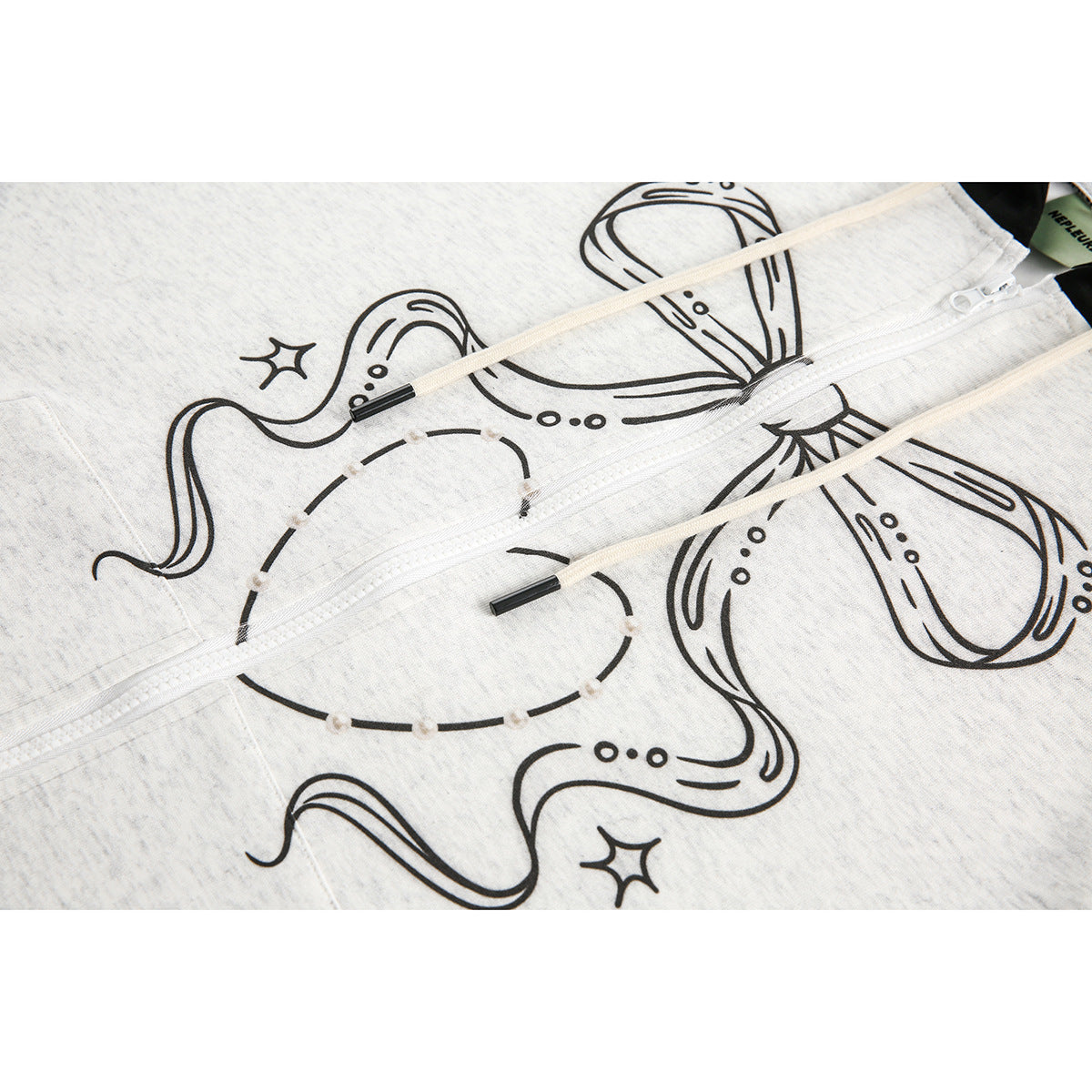 Close-up of black octopus line art, a white zipper, and cream drawstrings on a heather light-gray hoodie.