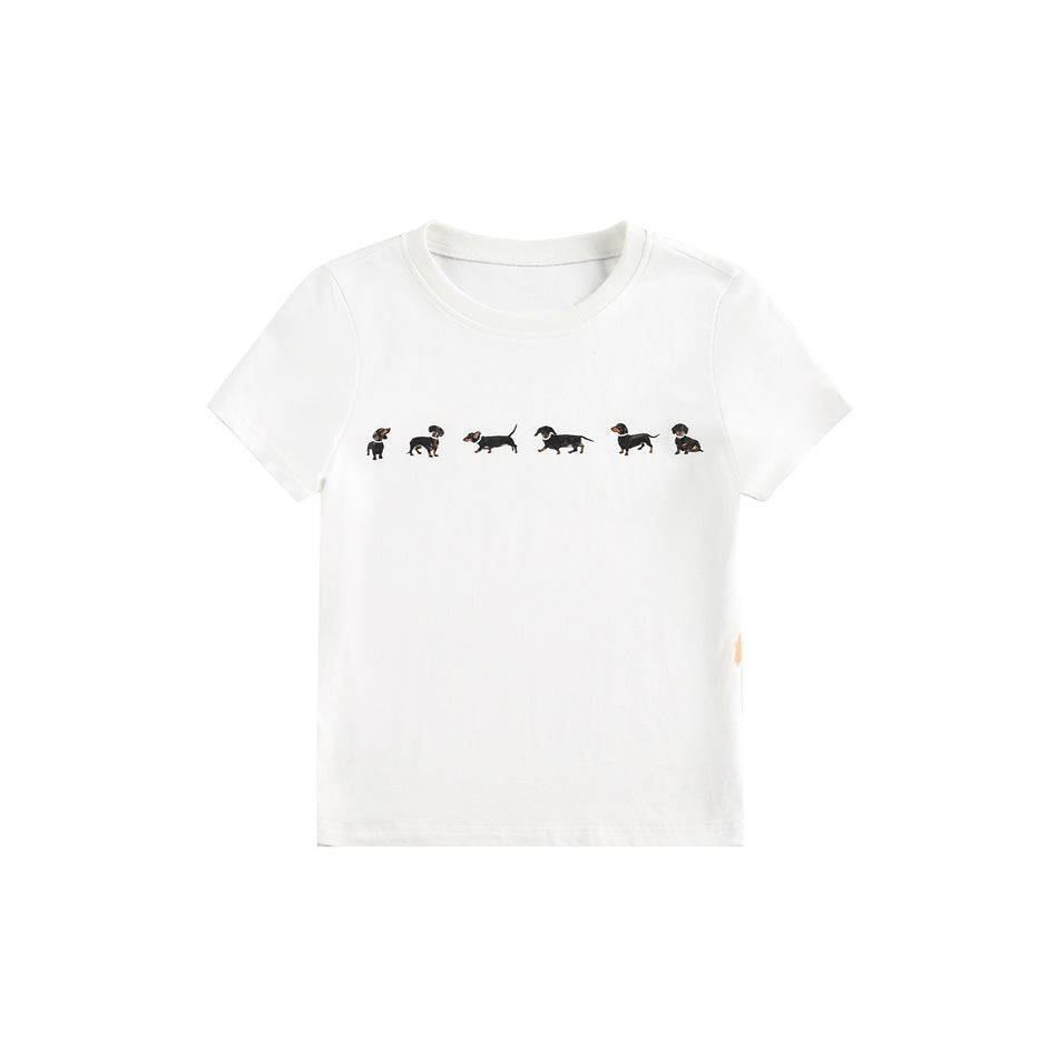White short-sleeve crewneck T-shirt with a row of six small black dachshund prints across the chest