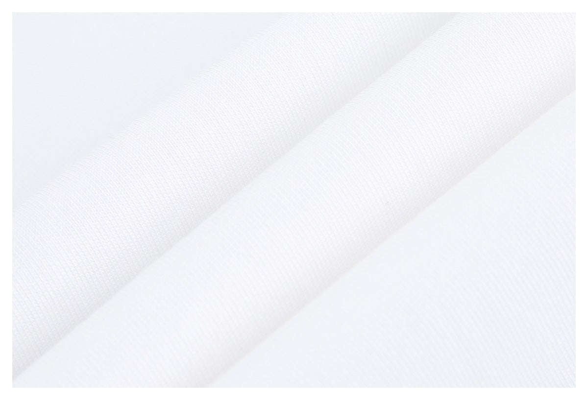 Close-up showing the fine knit texture and soft folds of white fabric.