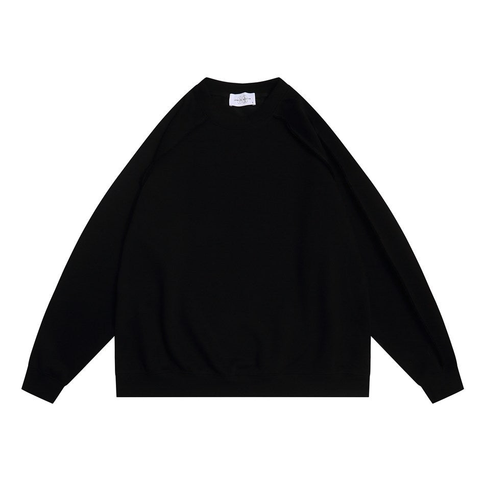 Black crew-neck sweatshirt with long raglan sleeves and ribbed cuffs and hem, flat front view