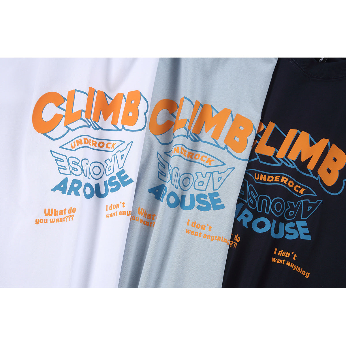 Three T-shirts in white, pale blue, and dark navy with matching orange and blue graphic prints.
