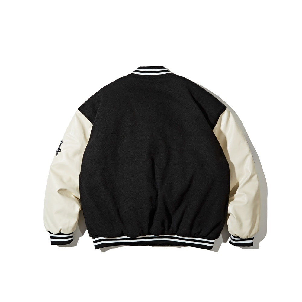Back view of a black varsity jacket with cream sleeves and striped ribbed collar, cuffs, and hem.
